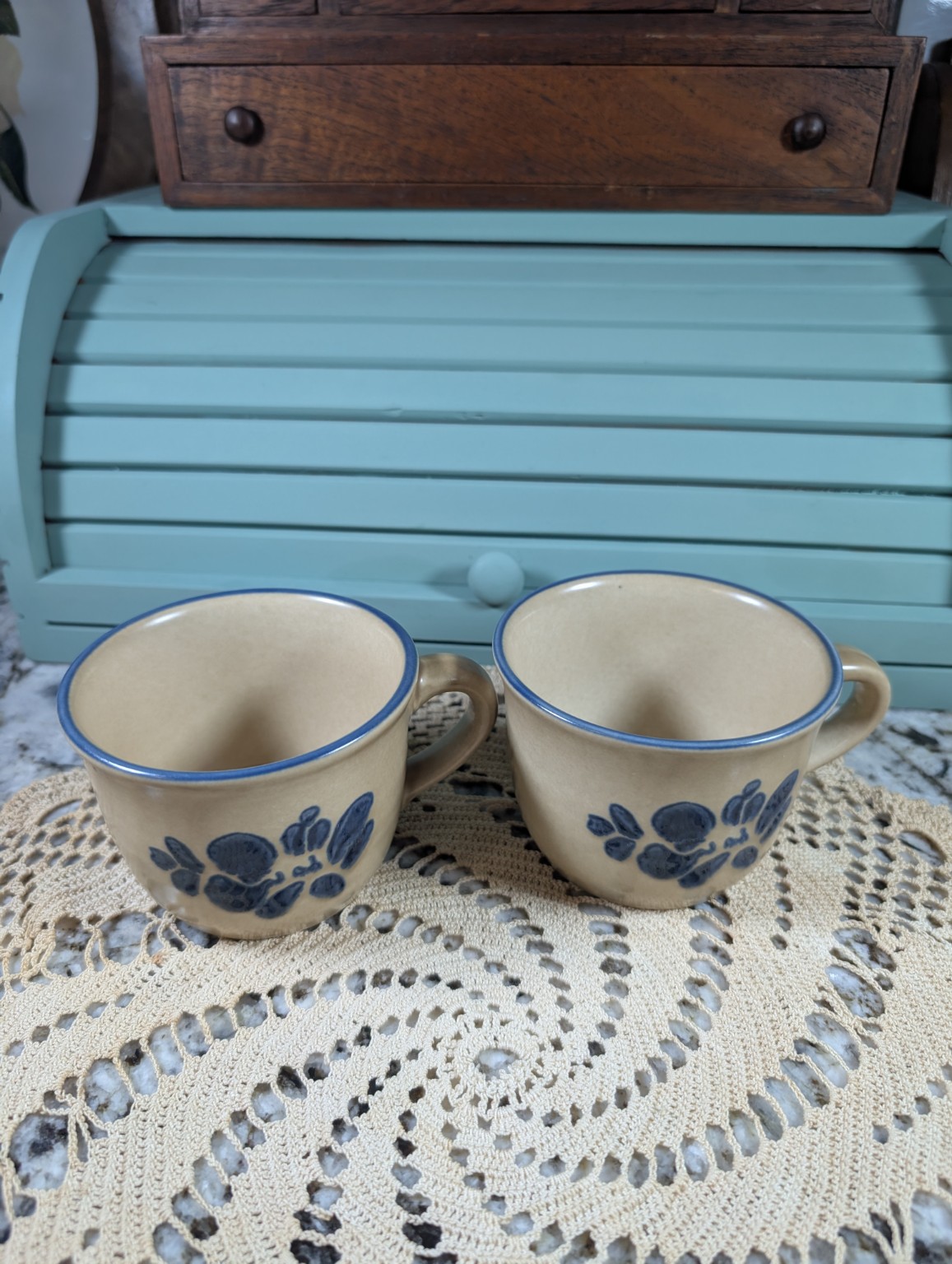 Pair of blue floral pottery cups